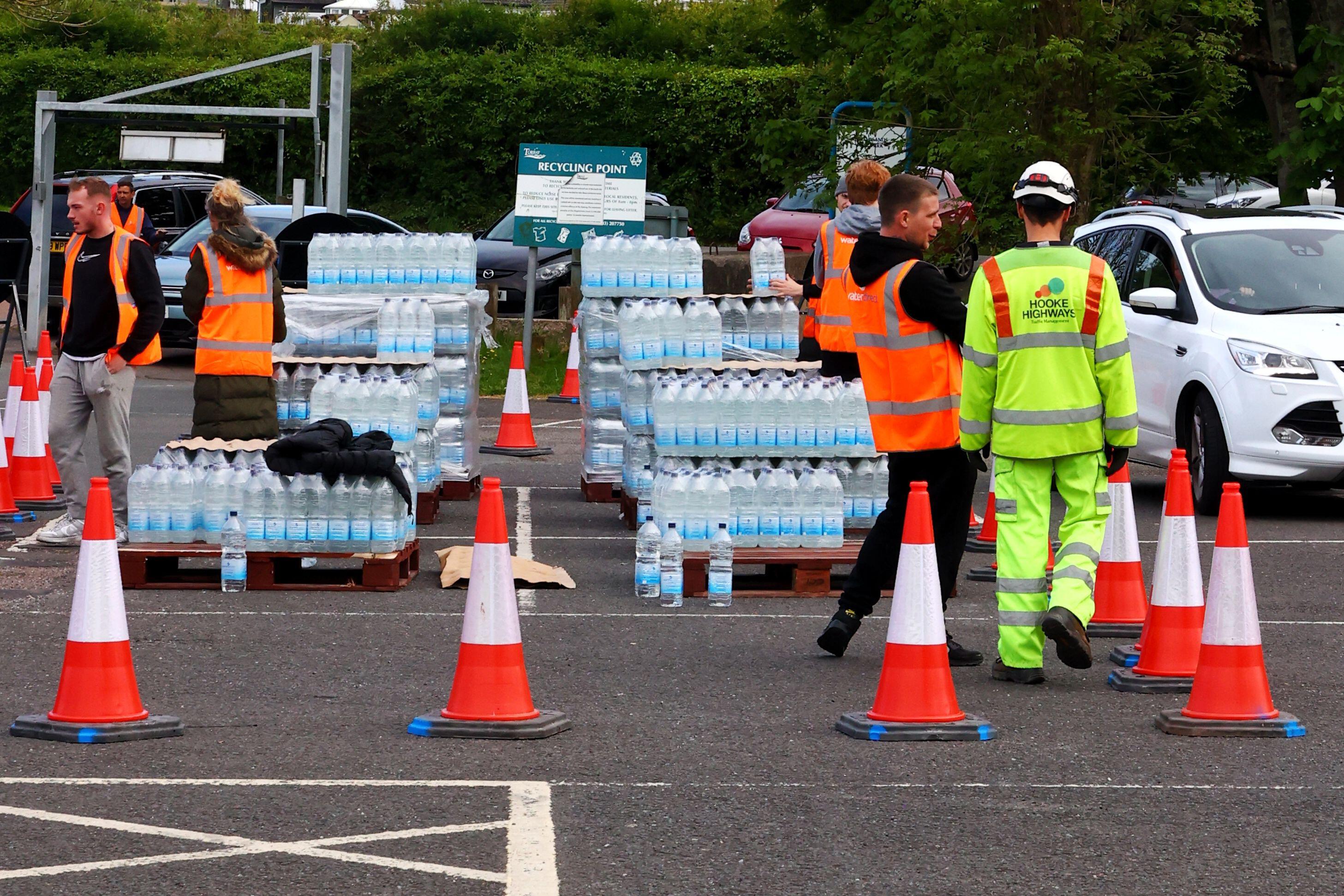 Emergency bottled water rations distributed to Brixham residents affected by a cryptosporidium outbreak.